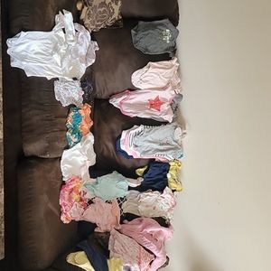 Variety of baby girl's clothes from NB to 9 months